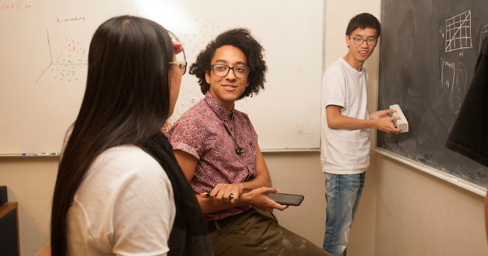  Chutong Wu, Zachary Spaulding, and Yupeng Li , all math majors, work together as they talk about mathematics in the undergraduate math lounge on Tuesday November 14, 2017.