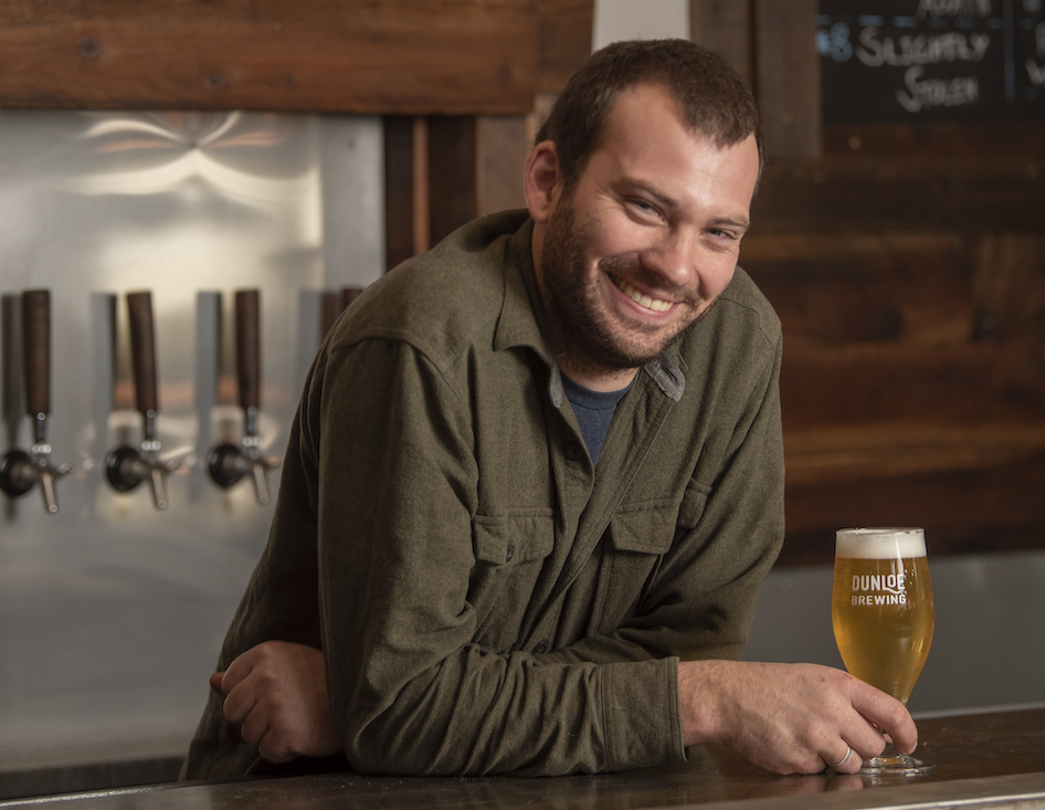 Brennan Fleming, photographed inside his Davis brewery, Dunloe Brewing. (Karin Higgins/UC Davis)