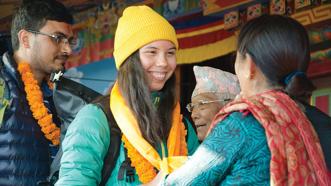 A college student receives a scarf