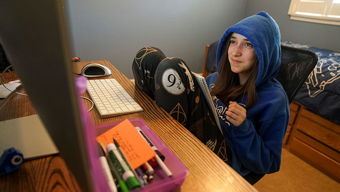 Emma Sturgis at her computer