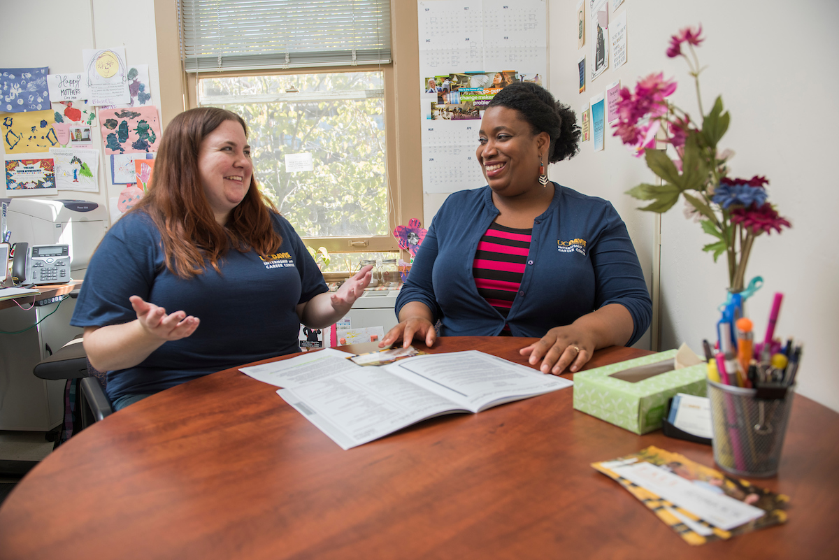 A student talks with an advisor at UC Davis. 