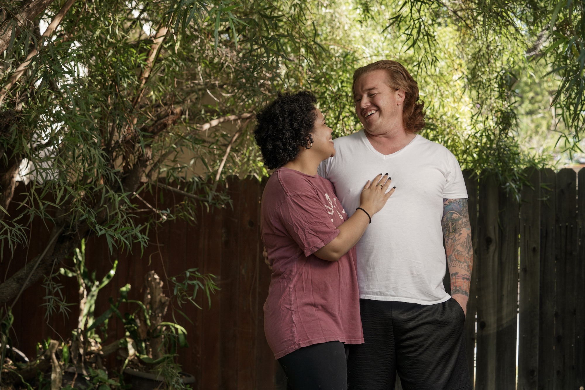 Matthew Treviño and Emily Fletcher stand outside their Sacramento home. The couple is taking part in a clinical trial to test a new hormonal birth control gel for men. (Karin Higgins / UC Davis) 