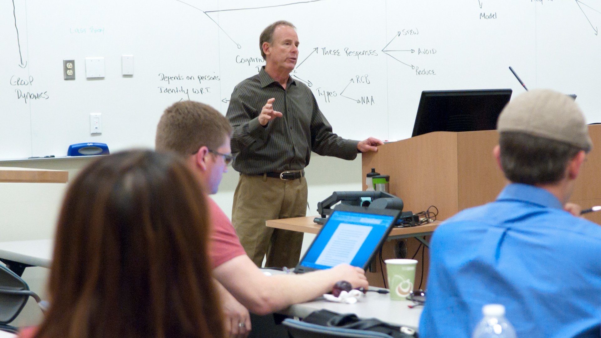 Man in classroom teaching