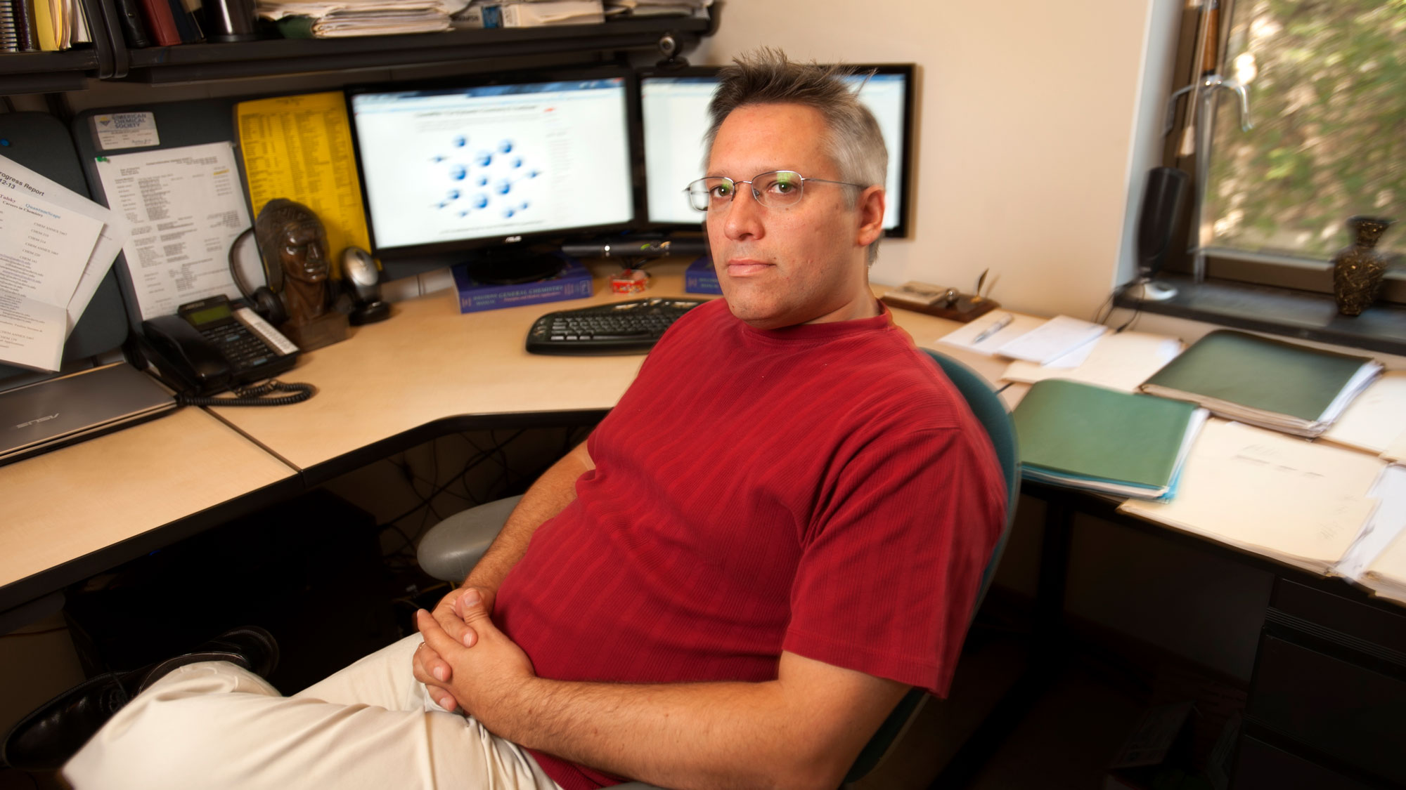 Delmar Larsen, at desk, portrait, UC Davis faculty