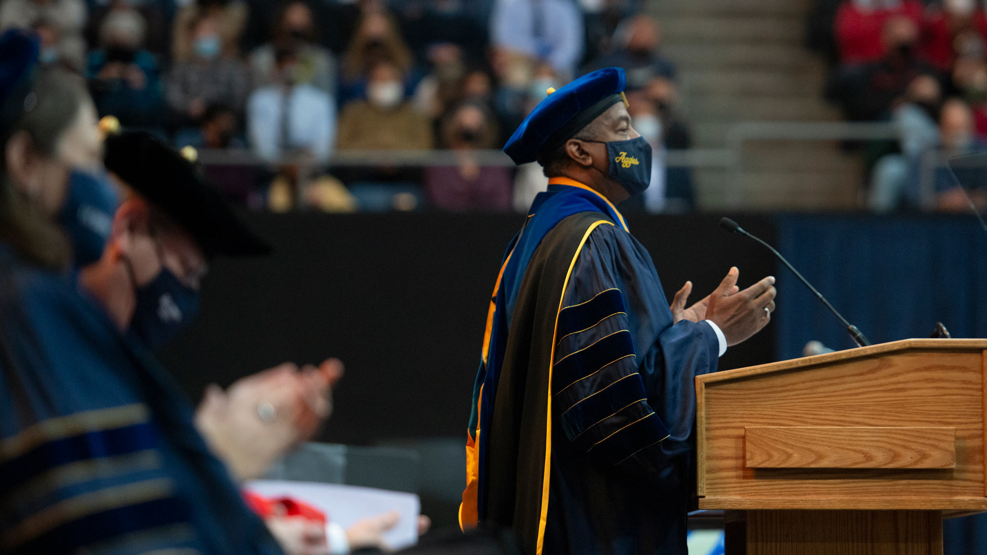 Chancellor May at podium for commencement