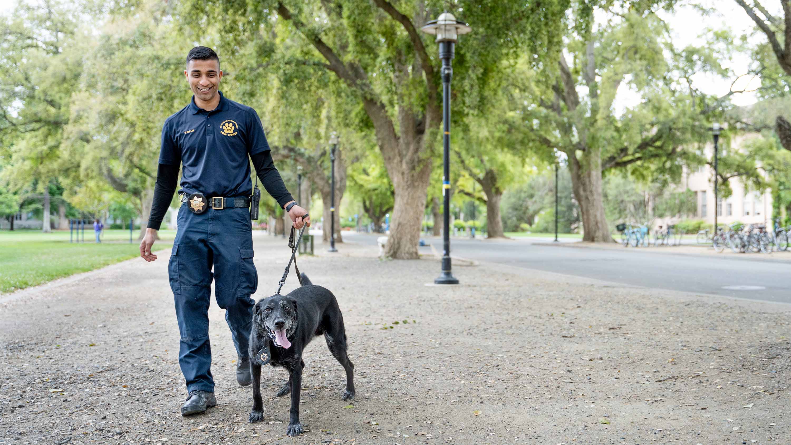 Core Officer Tabbasum “Tabby” Malik with Charlie in 2022