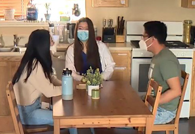 Students sitting at dining table