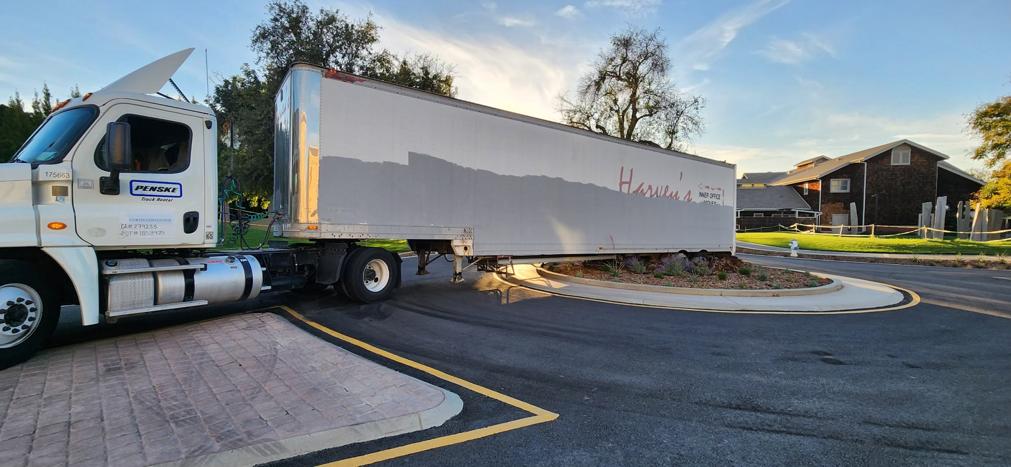 Tractor-trailer rig stuck on traffic circle