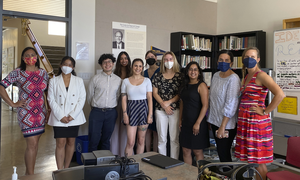 A group of students pose for a photo at UC Davis. 