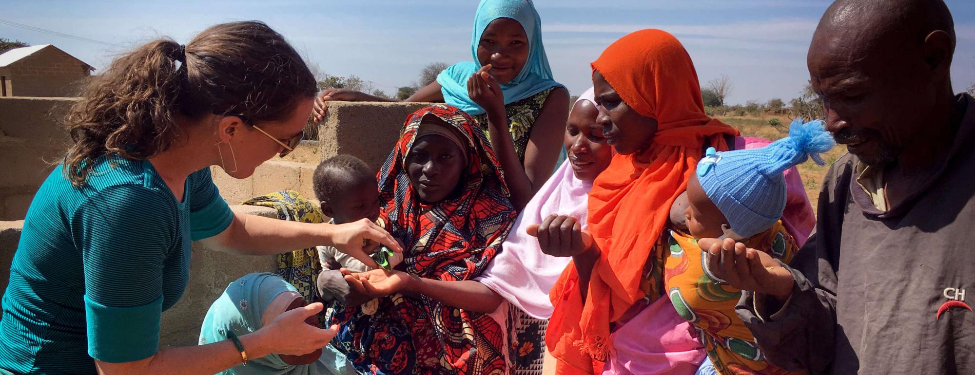 Carrie Waterman and Tanzanian community members