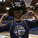 Basketball player wearing hat.