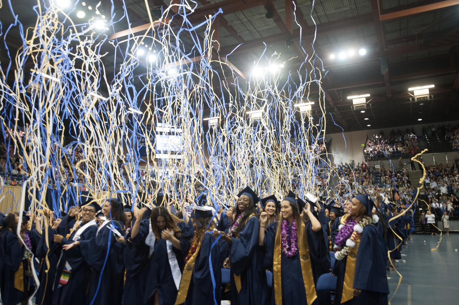 Streamers fall during a UC Davis commencement ceremony.