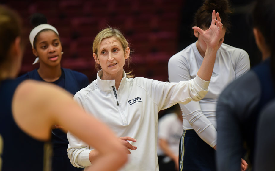 Coach gives instructions at practice.