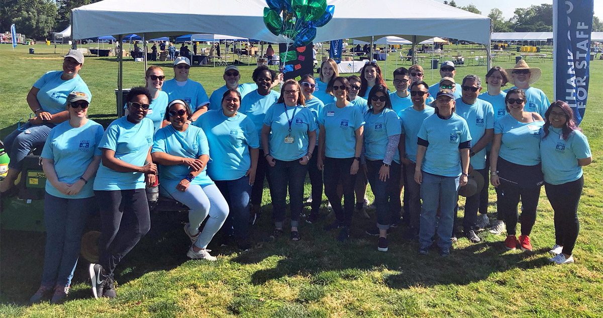 Volunteers pose for a photo