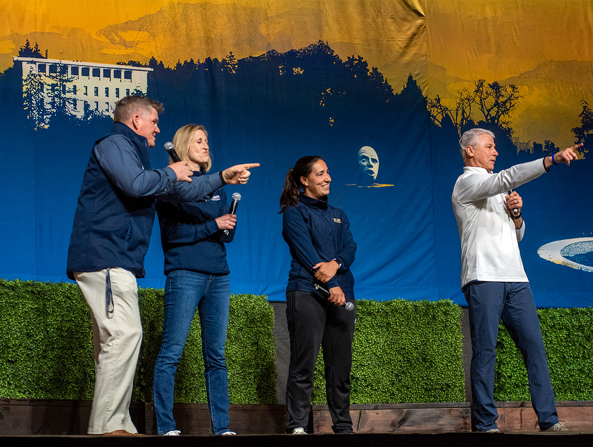 Four coaches on stage