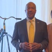 Chancellor Gary May and LeShelle in the memorabilia room, also known as the Aggie room in the Chancellor's Residence