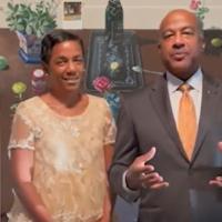 Chancellor Gary May and LeShelle standing in front of some pumpkins