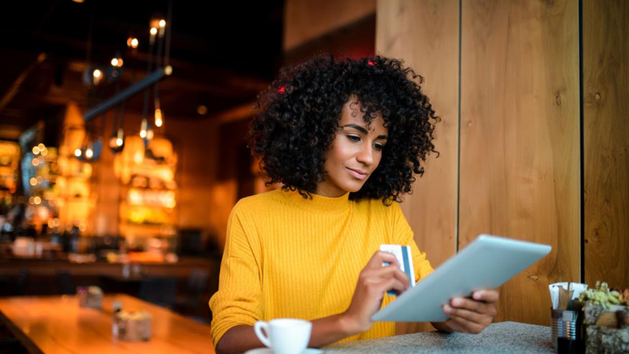 Woman with tablet.