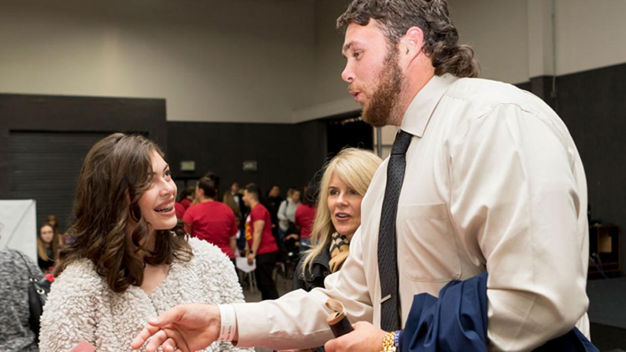 Kooper Richardson chats with his date, Maddie.