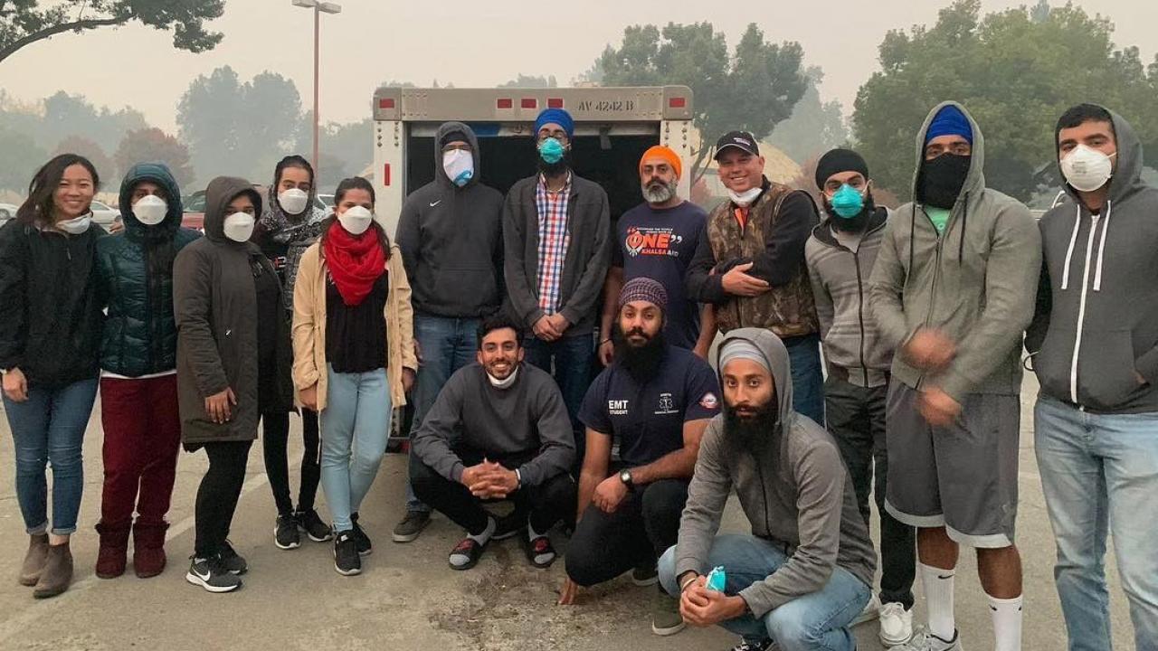 Members of the UC Davis Sikh Cultural Association wearing smoke masks.