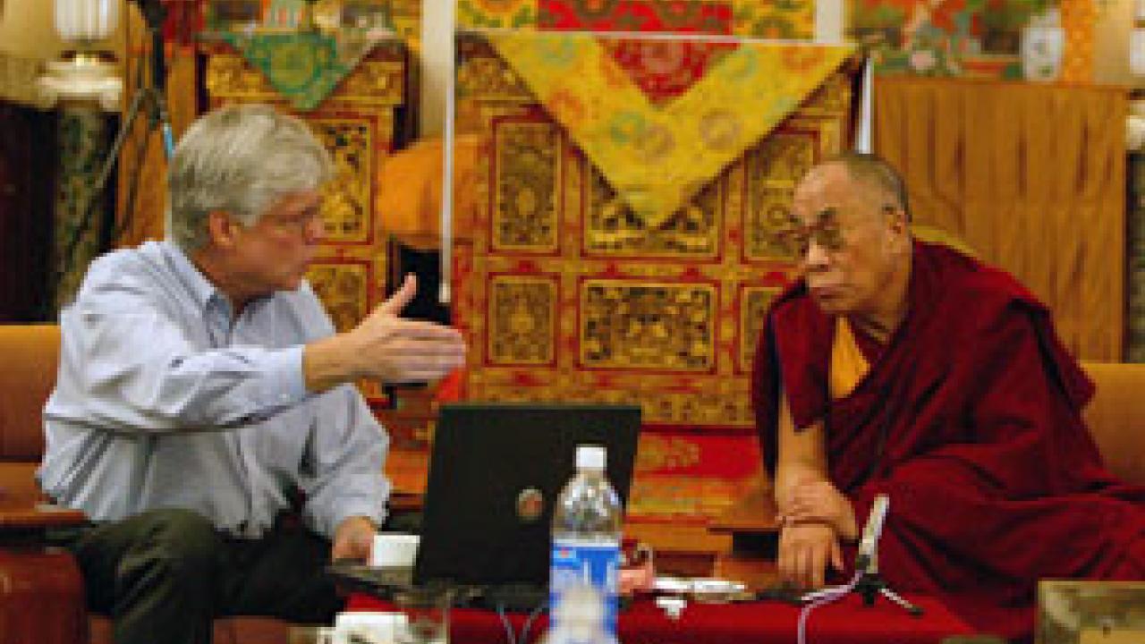 Phil Shaver talks with the Dalai Lama during last fall&rsquo;s meeting, which examined how people can alter the way they interpret and react to the world, a key tenet in Buddhist teachings.