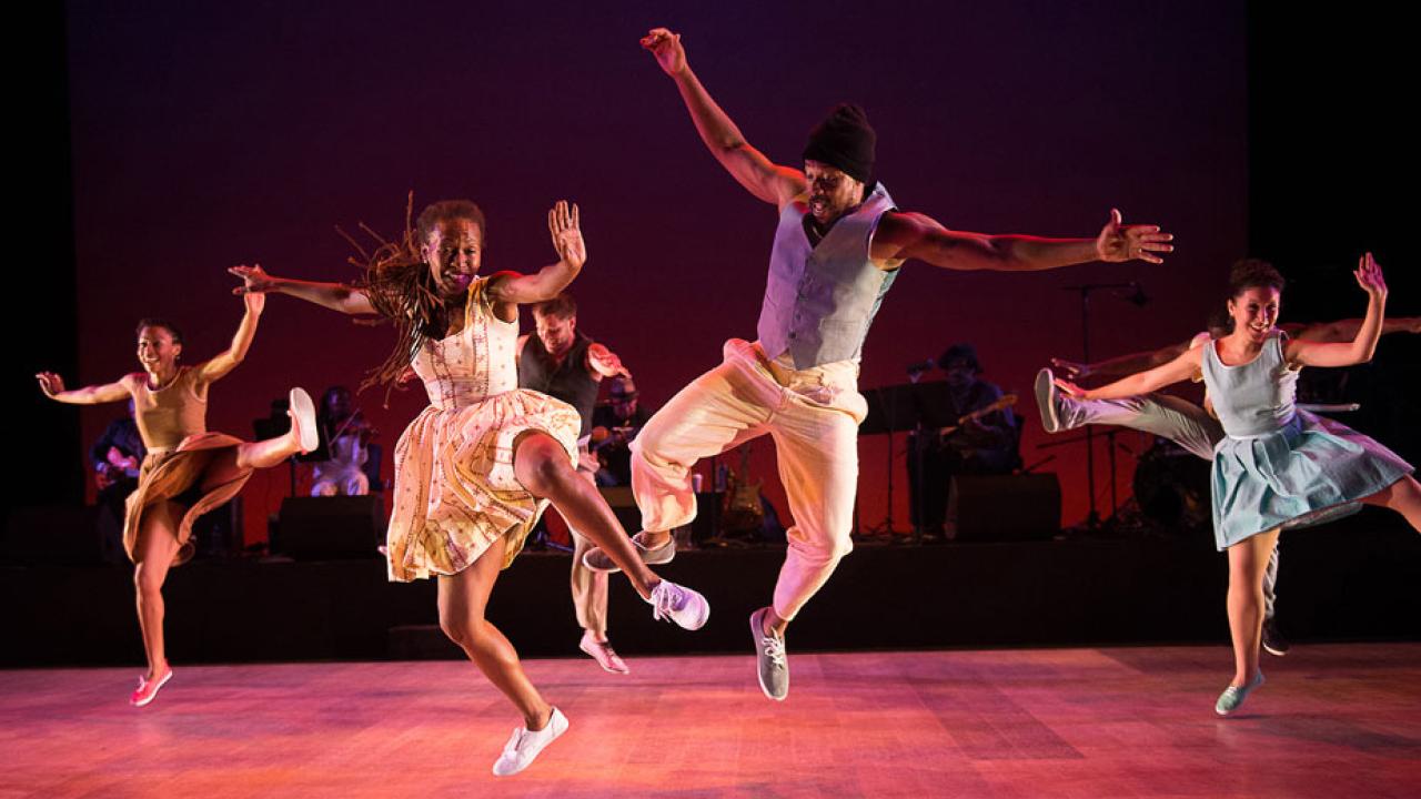 Dorrance Dance troupe on stage