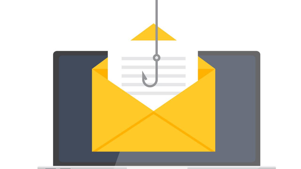 "Phishing" hook targets email on computer screen.