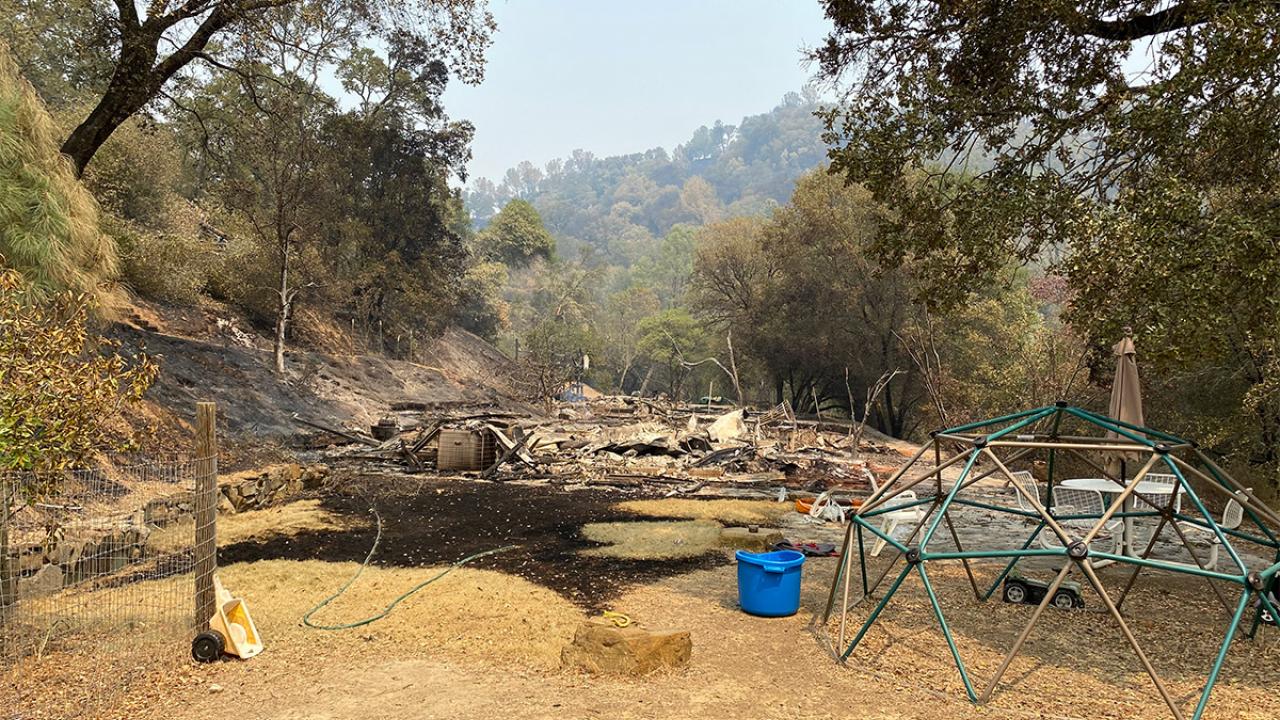 The remains of a burned house.