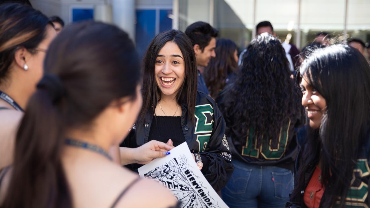 Students speak at outdoor event