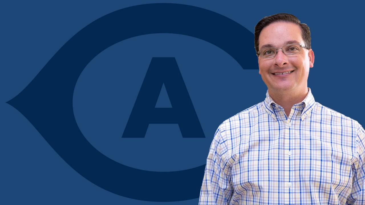 Rocko DeLuca cutout against backdrop of "CA" athletics logo