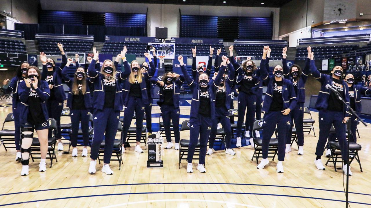 Aggie women's basketball team, cheering.