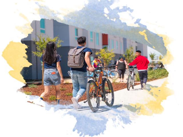 Two students walking on campus with a bike and buildings in the background overlayed on top of a watercolor brush stroke.