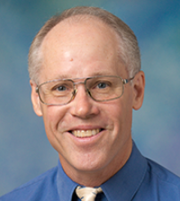 James Adams, political science professor, in blue shirt