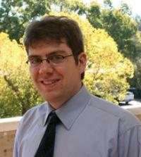 Head shot of UC Davis professor Paul Ullrich outdoors and smiling