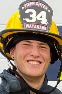 Kai Watanabe in UC Davis fire helmet, headshot