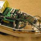 Photo: Part of a motorized vehicle with many wires