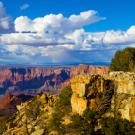 Photo: View of the Grand Canyon showing a cloud-covered sky