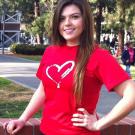 Photo: UC Davis senior Maria &ldquo;Lupe&rdquo; Espinoza, pictured wearing a UC Davis heart T-shirt