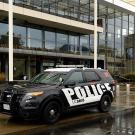 A UC Davis police car in front of the Mondavi Center.