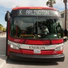 Front of red Unitrans bus