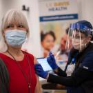 Woman receives vaccination.