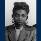 Dark-complected woman in black-and-white portrait photo 