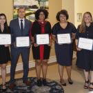 Group of award recipients, posed, in a line