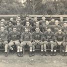 Photo of the 1938 Cal Aggies football team. The team is sitting on bleachers three rows deep.