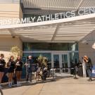 Man at podium, addressing UC Davis audience