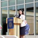 Xóchitl Rodriguez Murillo speaks on stage at event.