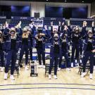 Aggie women's basketball team, cheering.