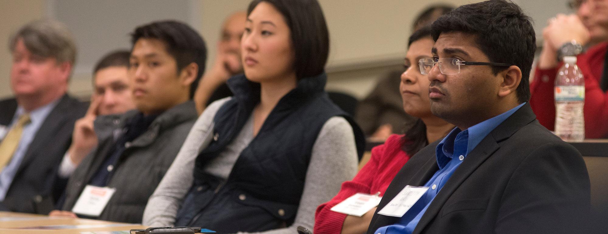 Students concentrate during a UC Davis Graduate School of Management class