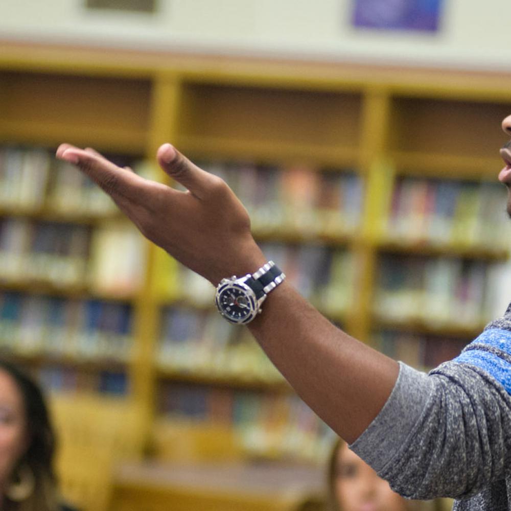 An English major performs a spoken word poem