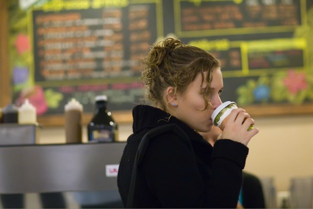 Woman drinking a cup of coffee